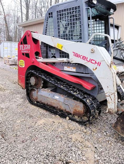 how to raise cab on tl230 takeuchi skid steer|takeuchi tl230 instructions.